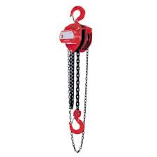 A red chain hoist hanging from chains.